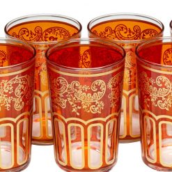 Vasos de té naranjas